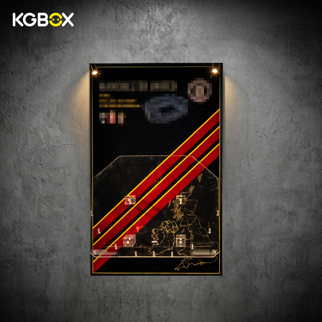 Empty wall-mounted KGBOX acrylic frame custom-sized for LEGO 10272 Old Trafford Stadium
