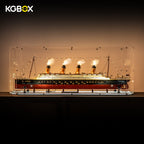 KGBOX gem-shaped acrylic display case for LEGO 10294 Titanic with build and lit ship lights, light-up engraved base with 4 spotlights