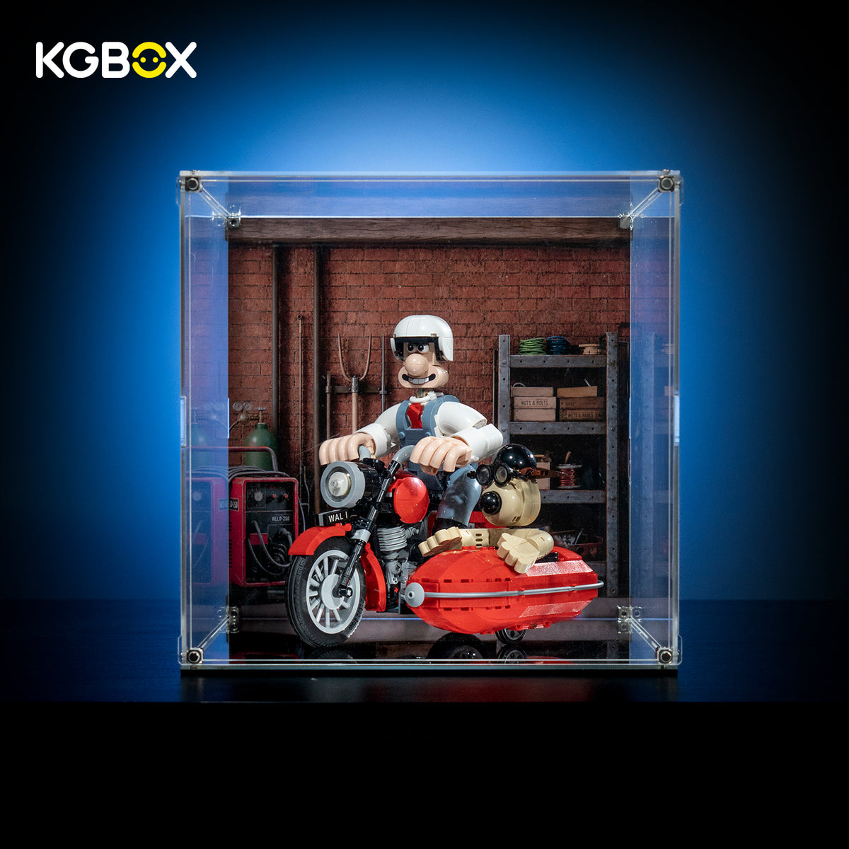 KGBOX standard acrylic display case with LEGO 21371 Wallace and Gromit motorbike, magnetic front door and UV-printed garage backdrop