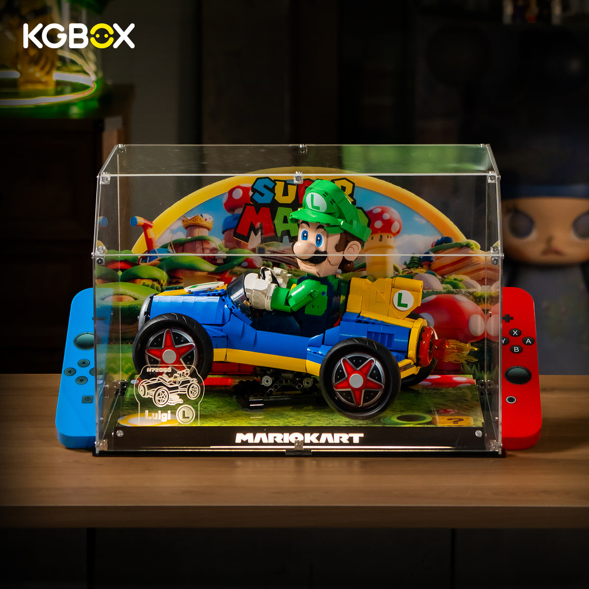 KGBOX clear acrylic display case for LEGO 72050 Mario Kart Luigi Mach 8 with Luigi Mach 8 set displayed inside - front view handheld-console design