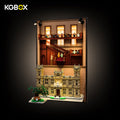 KGBOX LED wall display frame for LEGO 21373 Downton Abbey with build inside – two top spotlights, lit window panels, 3D staircase minifigure stand, UV-printed backdrop, wall-mounted