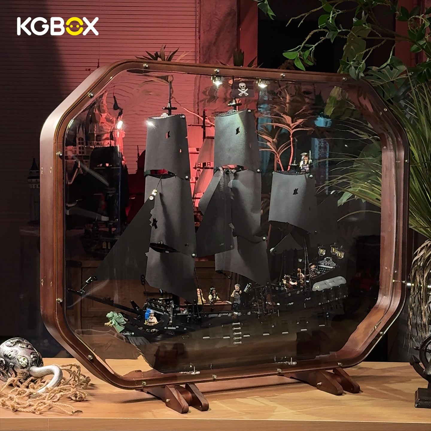 KGBOX original one‑piece solid wood display case with spotlights, fitted with LEGO 10365 Captain Jack Sparrow's Pirate Ship, front view