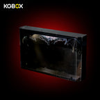 Side view of empty patented KGBOX wall display frame for LEGO 76271 Gotham City, presenting frame outline and reinforced wall hanging bracket