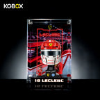 KGBOX Premium Collector Modular Edition display case with LED lights, engraved nameplate & laser‑etched insert, loaded with LEGO 43014 Charles Leclerc Ferrari Helmet, front lit view