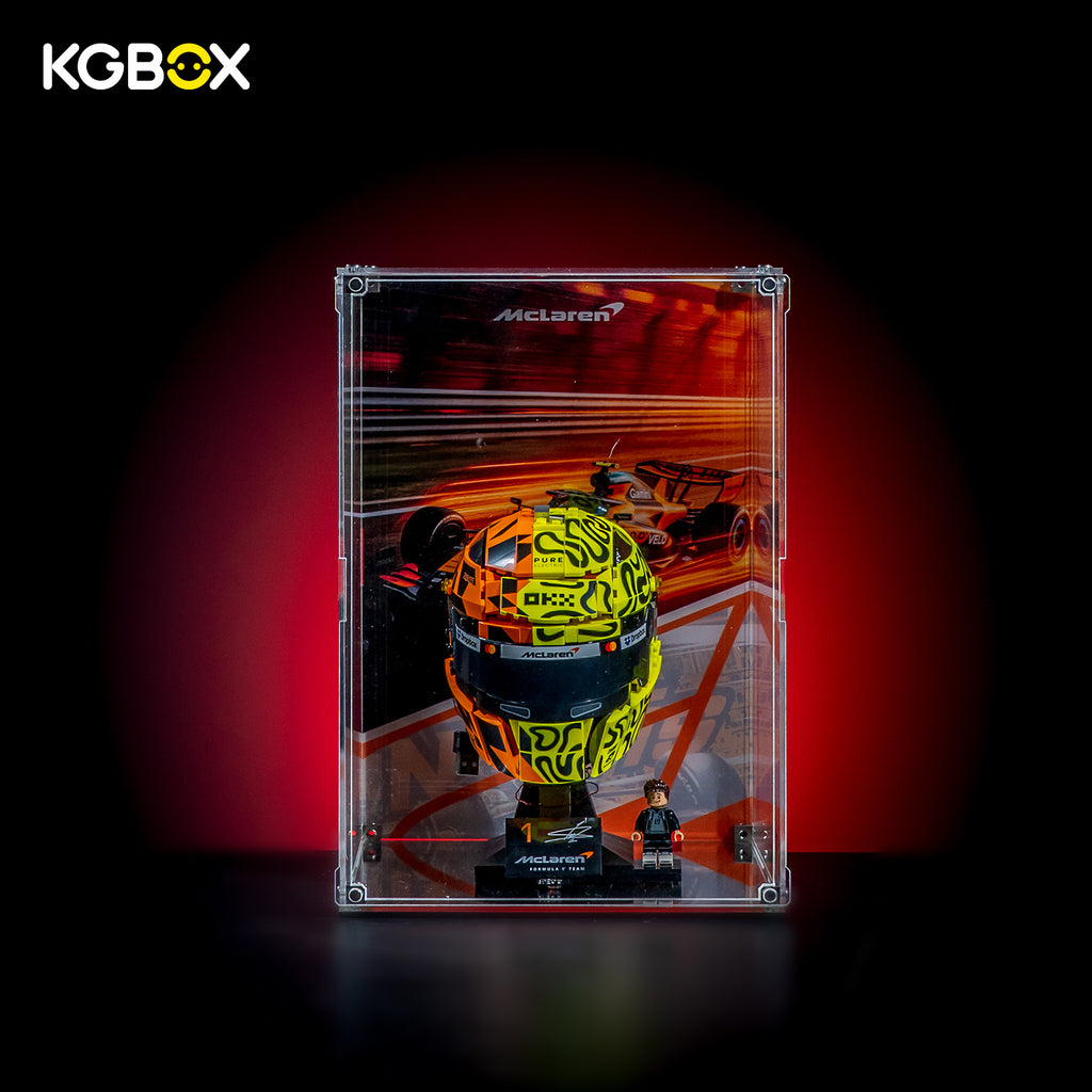 KGBOX Modular Assembly Edition acrylic display case loaded with LEGO 43023 Lando Norris McLaren Helmet, UV backplate, magnetic door and mirror base, front view