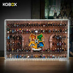 KGBOX LED wall‑mount acrylic display case with upgraded 5mm outer frame, LEGO 76462 Hogwarts House Crest and 124 Harry Potter minifigures, lit front main view